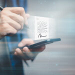 User signing a digital document on a smartphone using Electronic Signatures, showcasing fast and reliable electronic contract signing technology.