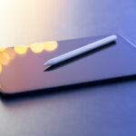 User interacting with a tablet to complete Esignature for Procurement tasks, showcasing the efficiency of a digital signature app for Procurement processes.