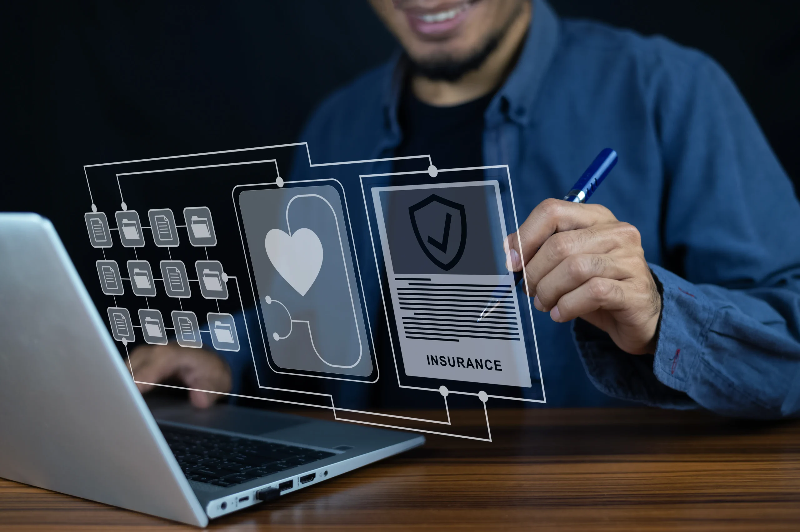 Professional reviewing digital insurance documents on a laptop using Electronic Signatures for Insurance with a secure eSignature app for Insurance.