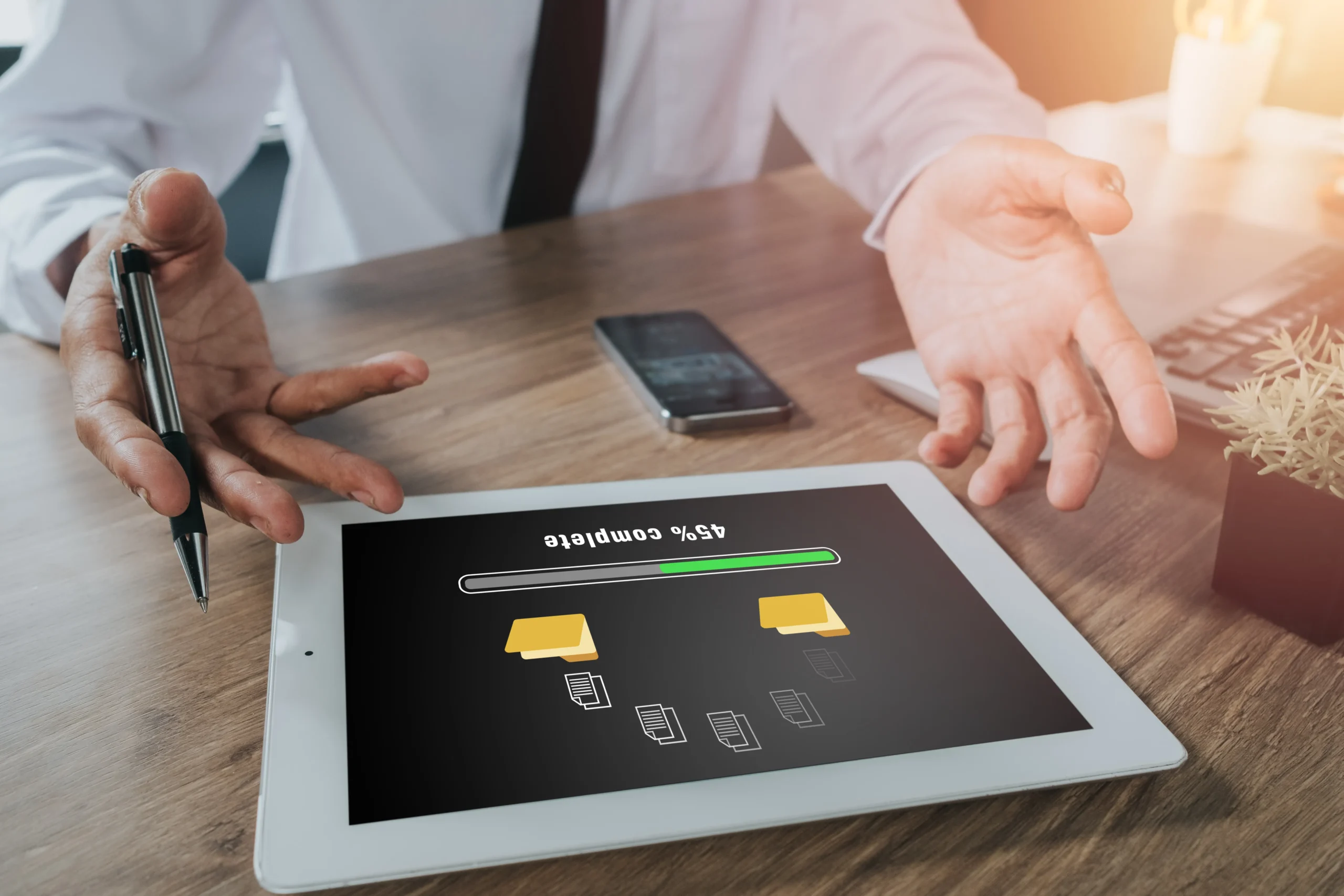 Insurance agent explaining digital file completion on a tablet using Electronic Signatures for Insurance through a reliable eSignature app for Insurance.