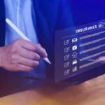 Insurance agent using a digital tablet to manage electronic insurance claim forms with eSignature technology for faster claim processing.
