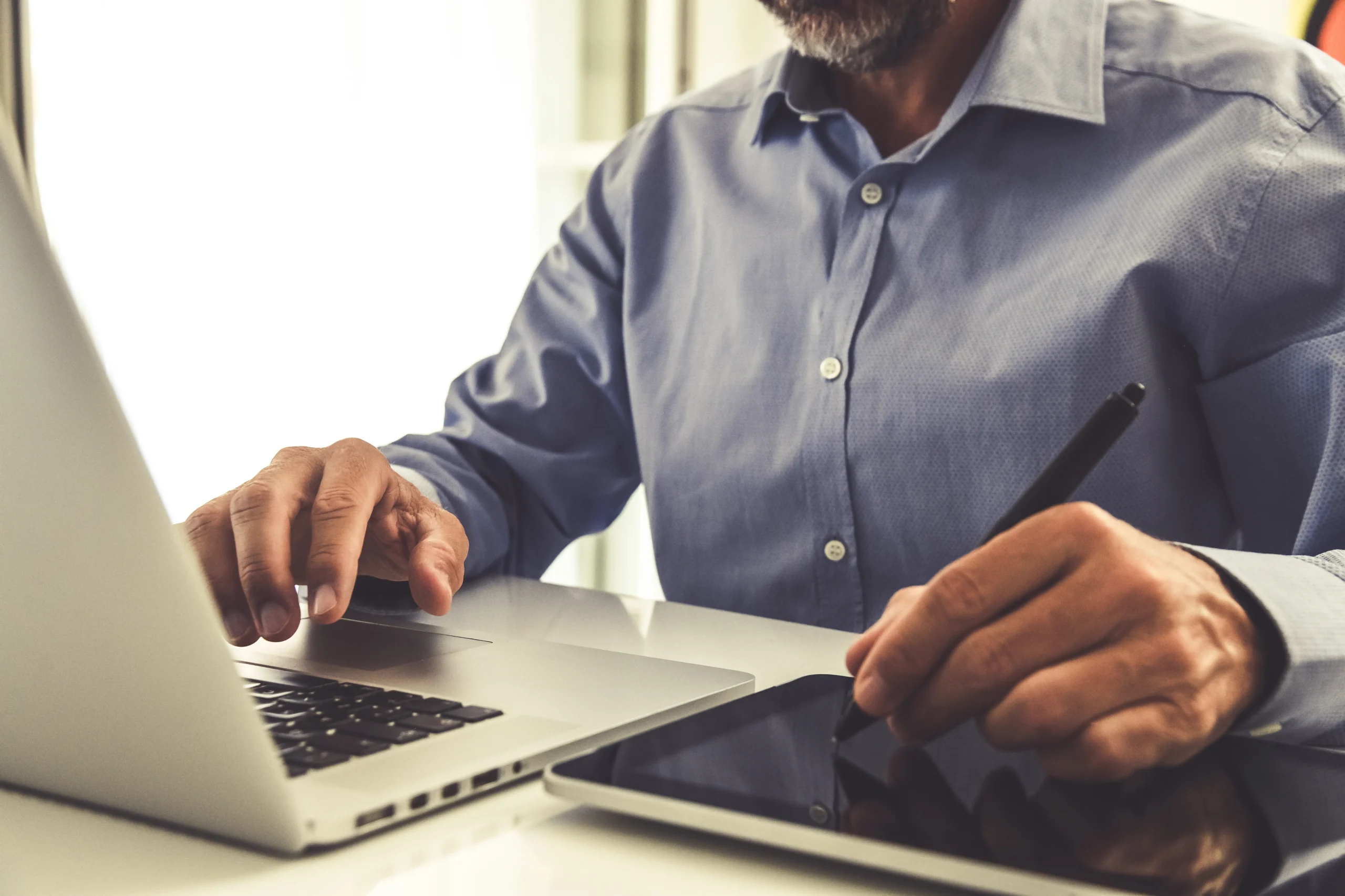 Insurance adjuster using mobile device for digital claim approval via eSignature workflow.
