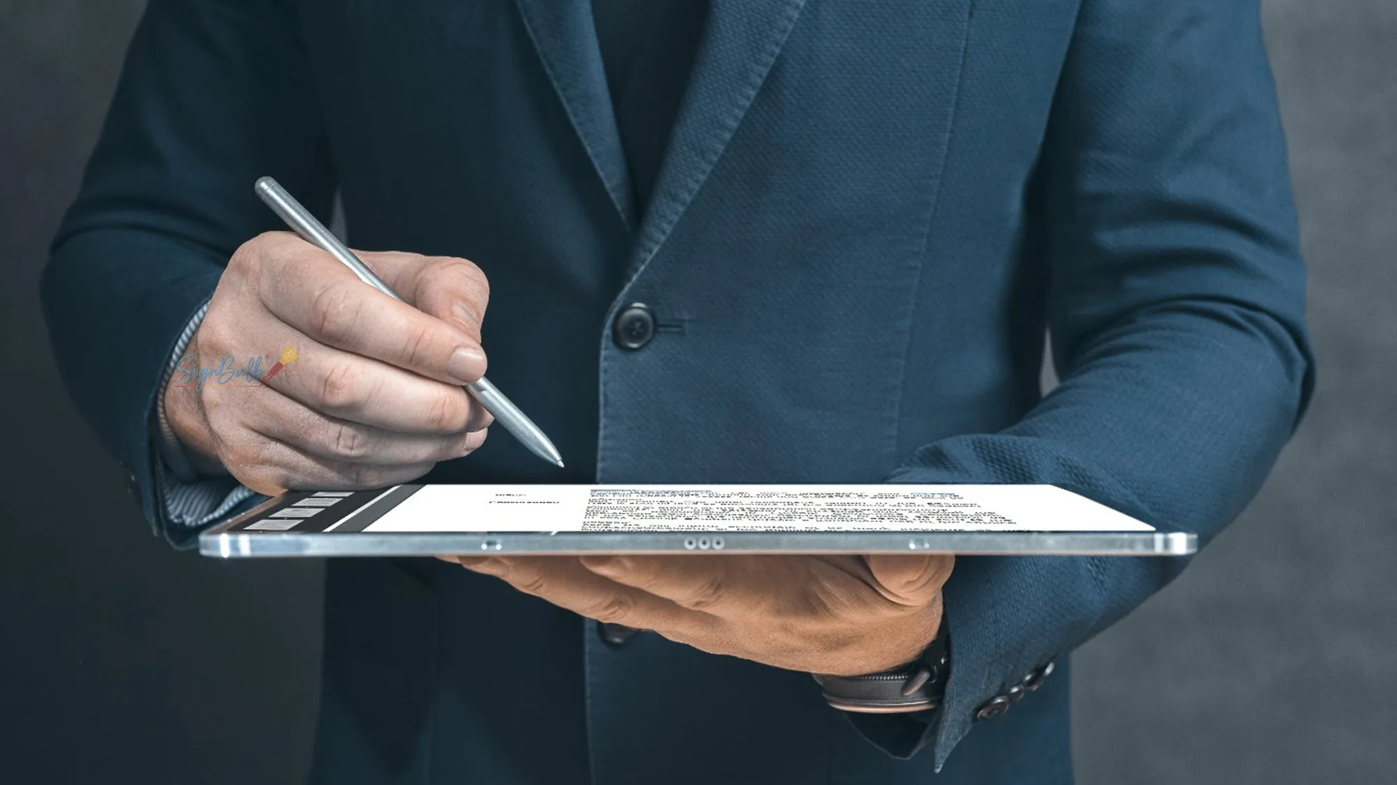 Professional signing a digital document on a tablet with a contract signing tool, demonstrating how to sign agreement online using a secure free contract e sign feature.