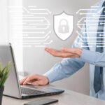 Secure eSignature service for financial agreements showing encrypted digital signature process on laptop with fraud protection icon