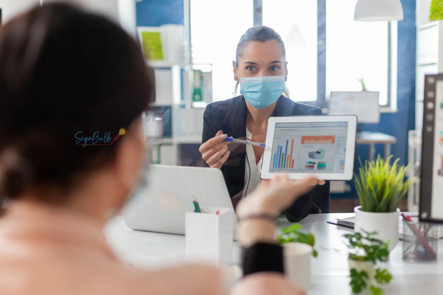 Healthcare professional using a digital signature app to create free digital signature with secure electronic signatures