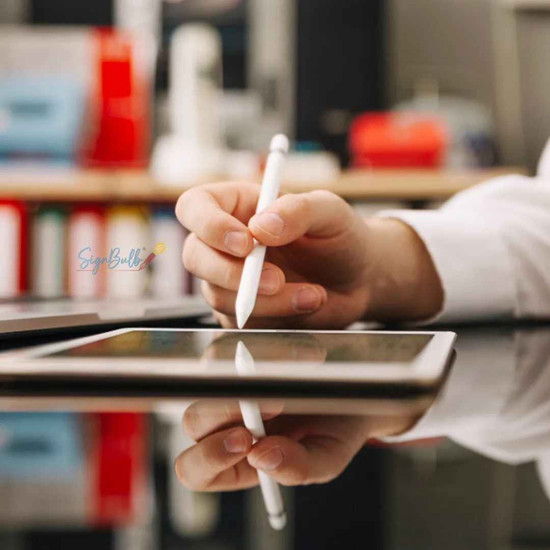 User signing documents on a tablet with a secure online signature using an e signature app for fast contract approval.