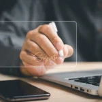Digital signature tool used on laptop for online signing and eSignature referral commission programs.