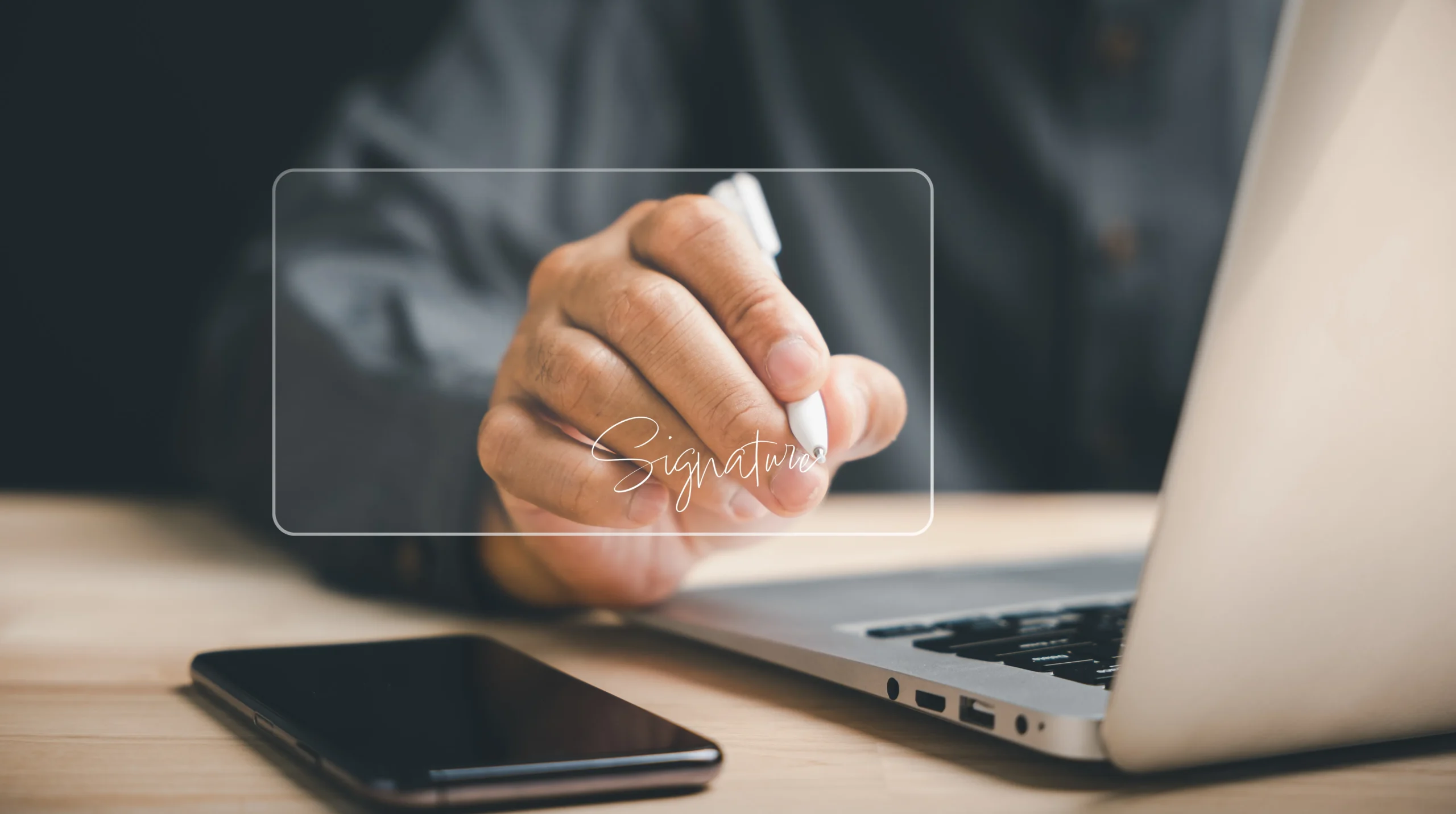 Digital signature tool used on laptop for online signing and eSignature referral commission programs.