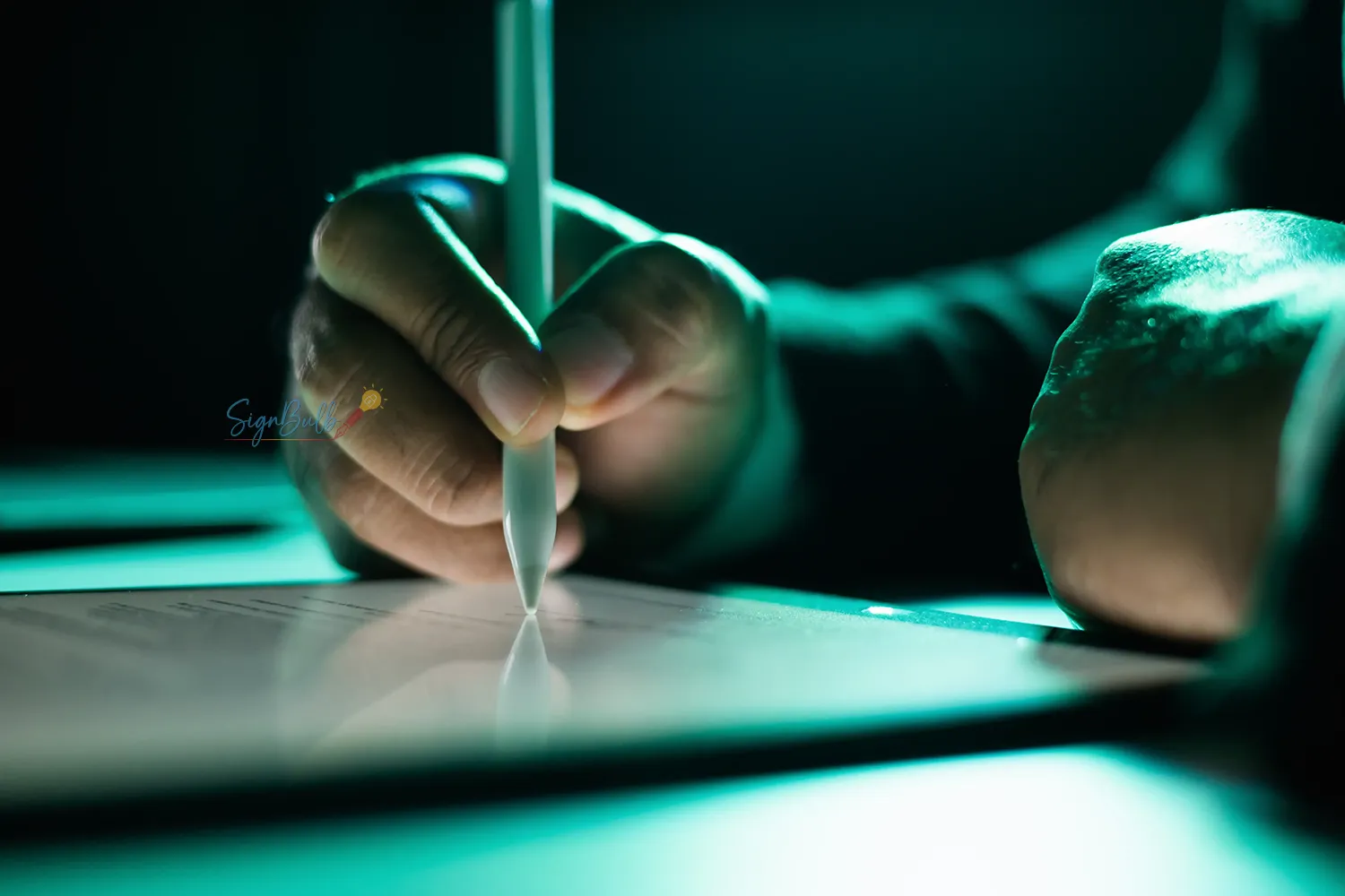 Signing a document on a tablet with a stylus, showing how e-signature software like SignBulb makes digital signatures quick and secure.