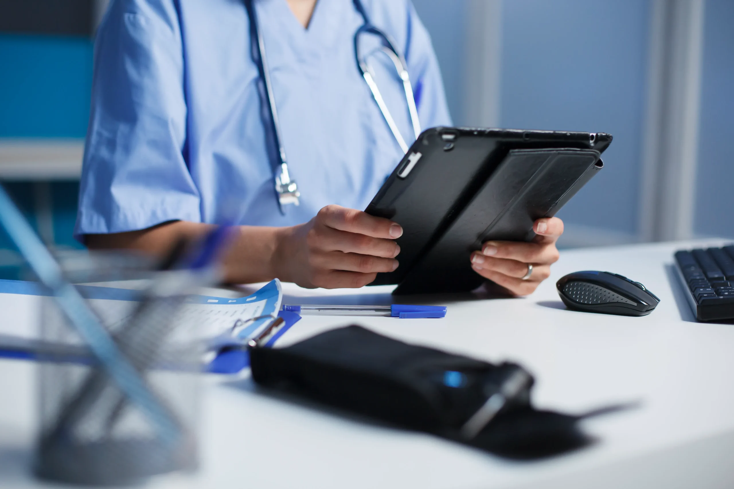 Clinician using HIPAA compliant eSignature software for healthcare document signing software and smoother patient onboarding.