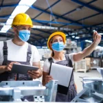 Plant managers using a signature app and document signing app for eSignature for manufacturing.