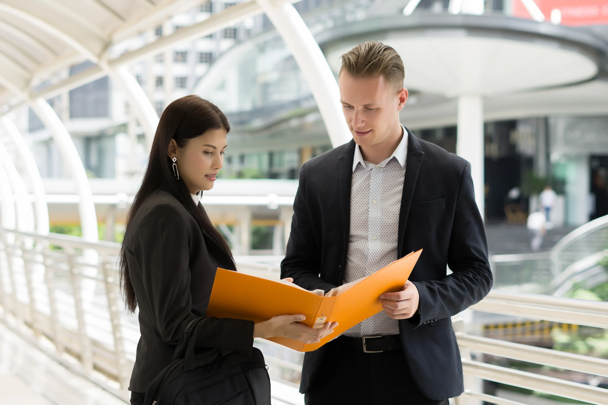 Corporate team reviewing documents for efficient Supplier Contract Management.