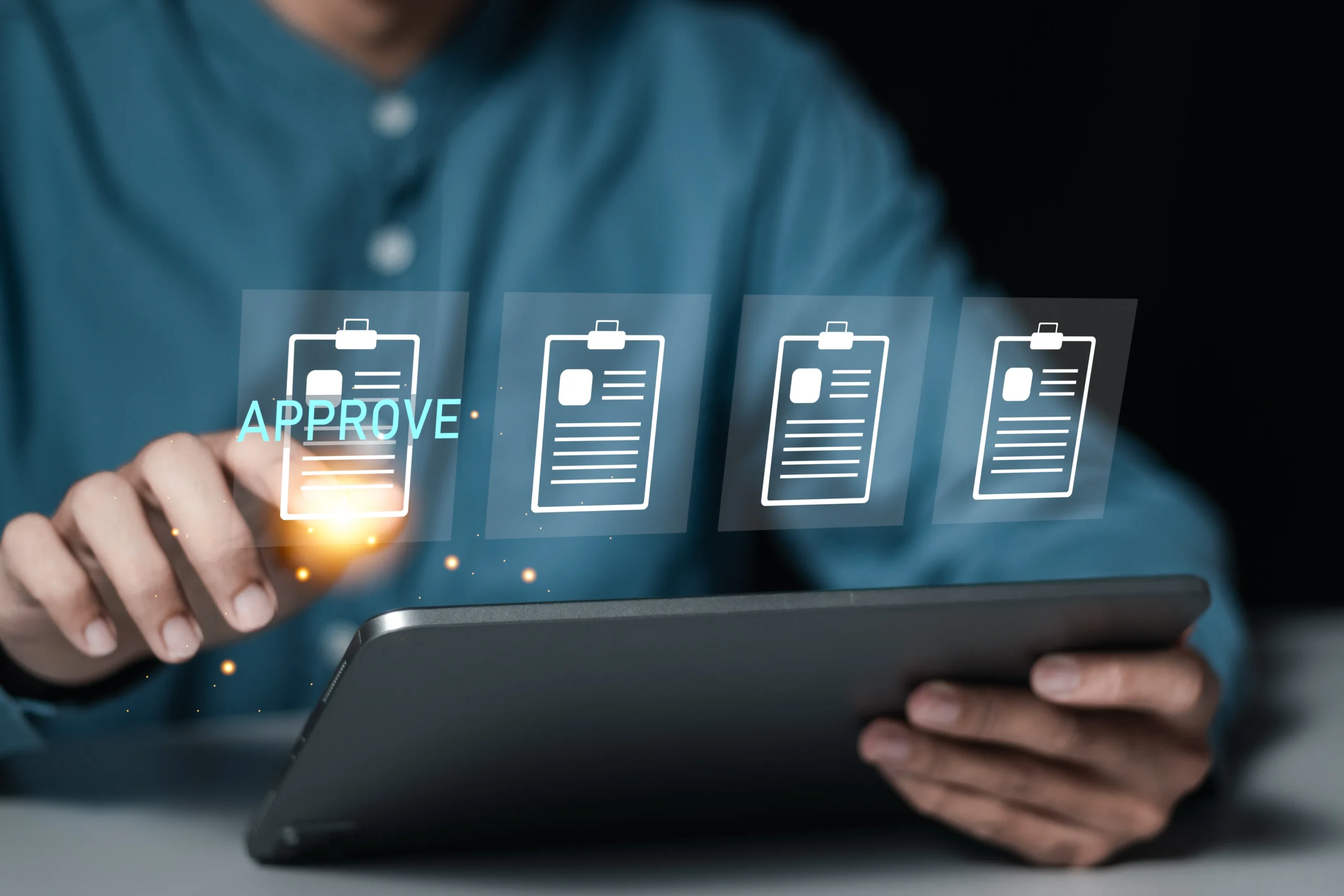 User approving digital contracts on a tablet screen using mobile esignature software.