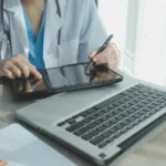 Healthcare provider executing patient intake forms with a stylus using a hipaa compliant esignature solution.