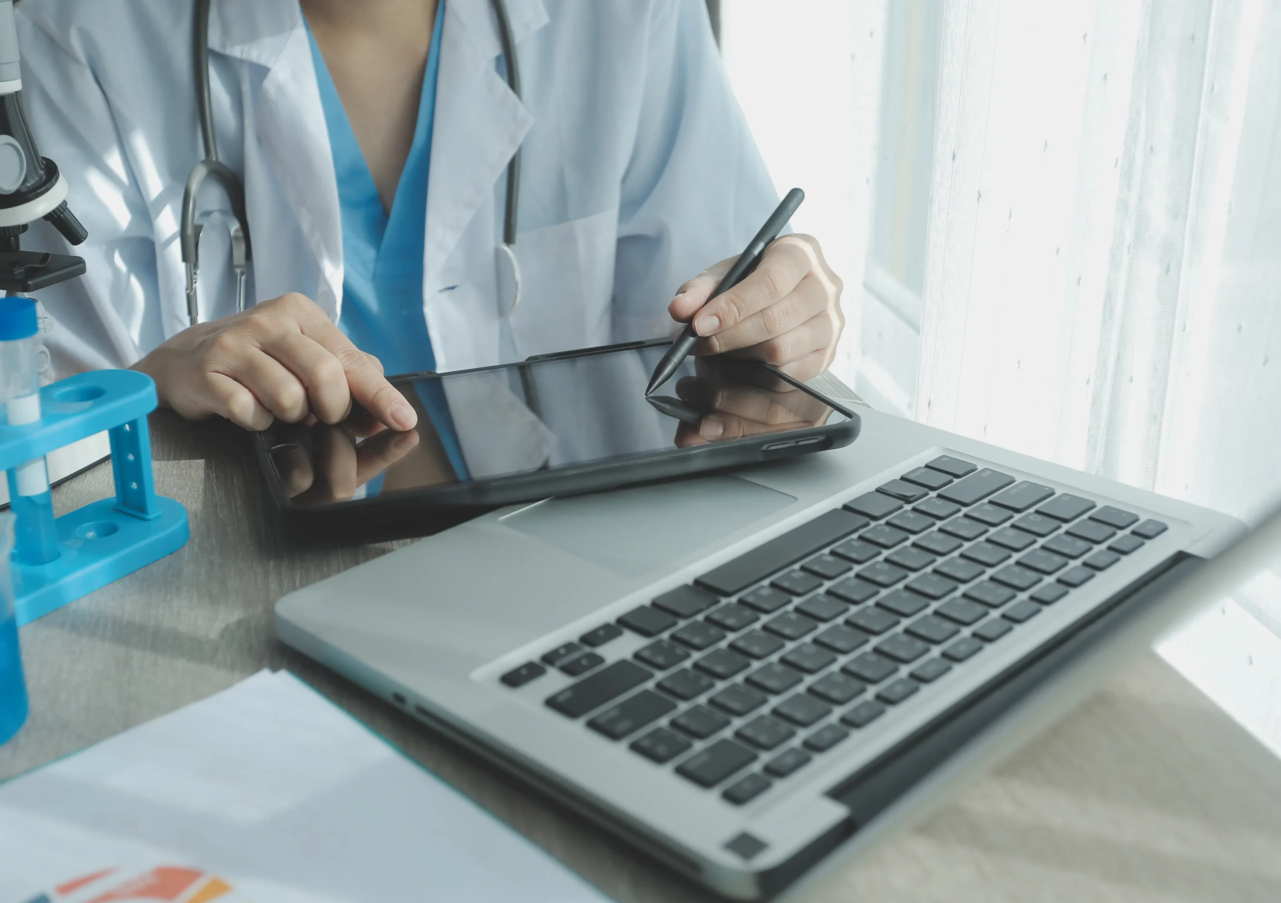 Healthcare provider executing patient intake forms with a stylus using a hipaa compliant esignature solution.