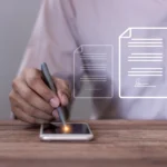 Person using a stylus to sign contract on phone using floating document verification overlays.