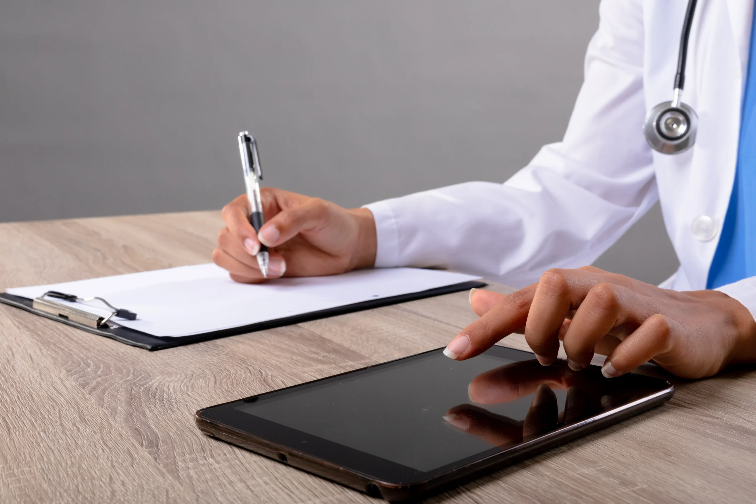 Healthcare professional validating patient agreements with secure cloud software backed by a baa for eSignature.